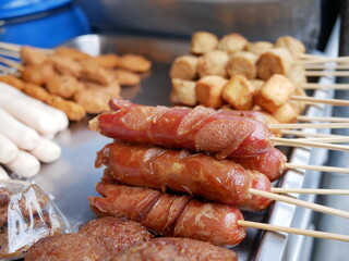 grilled sausage skewer bamboo for sale on street food.
