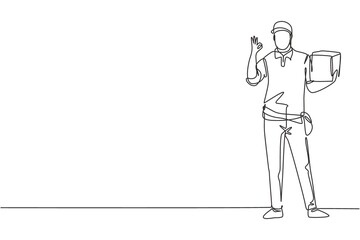 Continuous one line drawing deliveryman stands with gesture okay carrying package box that customer order to be delivered safely. Success business. Single line draw design vector graphic illustration