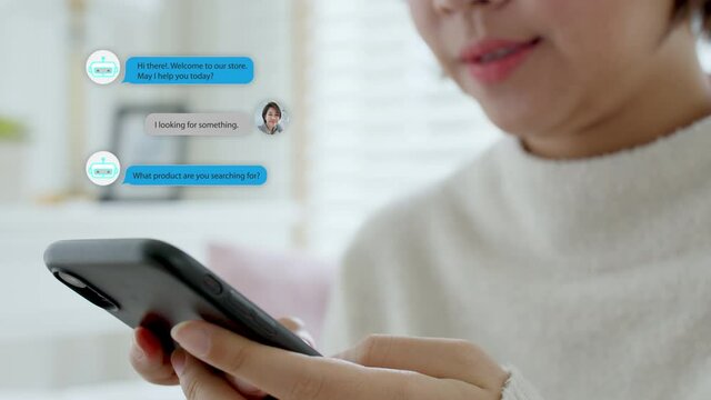 Close-up hand asian people use mobile phone happy buy online at home talk to ai shop store app ask data chat bot in sme social e-commerce web B2C crm iot pop up dialog text help seller smart life.