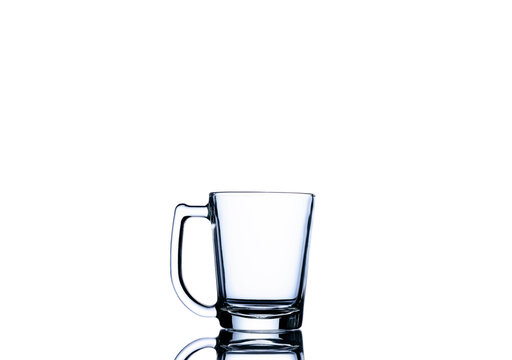 An empty glass for water, juice or milk Cocktail drink Household items Isolated on white background