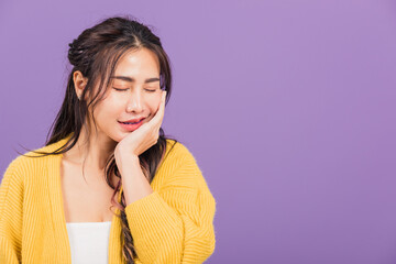 Portrait of Asian beautiful young woman suffering from toothache, female terrible strong teeth pain...