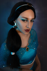 Beautiful princess closeup with magic lamp in her hands. Art photo.Jasmine princess cosplay.