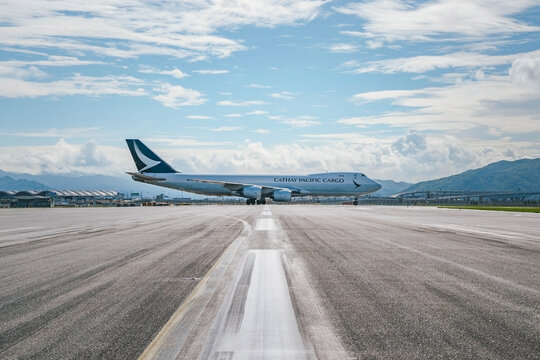 Cathay Pacific Cargo jumbo aircraft crossing runway at Hong Kong airport on August 3, 2020 in Hong Kong