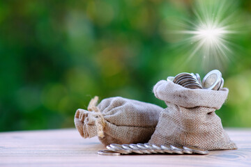 Close up coins on table background and saving money and business growth concept, finance and investment concept, macro coins
