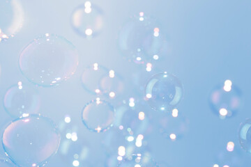 Freshness Natural with Transparent  Soap Bubbles Float on Blue Background.