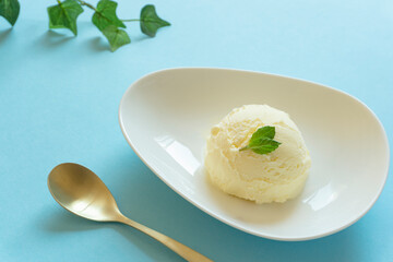 Ice cream on light blue background.  水色背景上のアイスクリーム