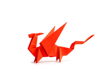 Origami dragon on isolated white background. Dragon of paper. Red