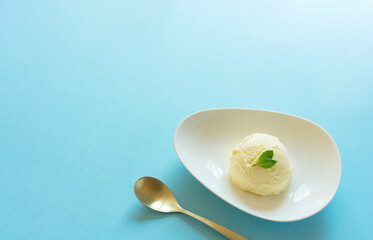 Ice cream on light blue background.  水色背景上のアイスクリーム