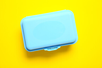 Plastic lunch box on color background