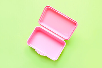 Plastic lunch box on color background