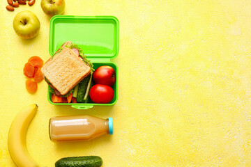 Lunch box with tasty food on color background