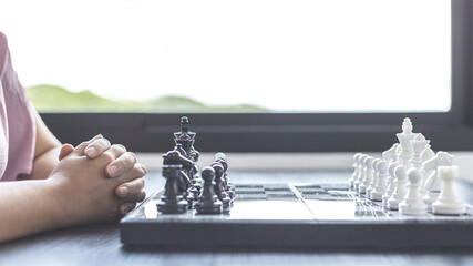 Businesswoman playing chess, Proactive business planning and marketing strategy just like playing chess, Business competition and success, Leadership concept.