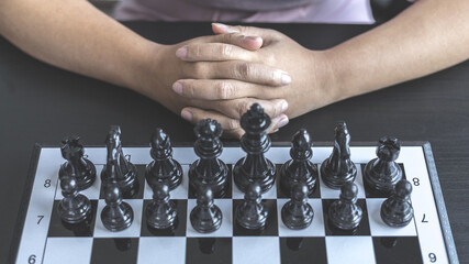 Businesswoman playing chess, Proactive business planning and marketing strategy just like playing...