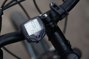 speedometer mounted on a bicycle handlebar