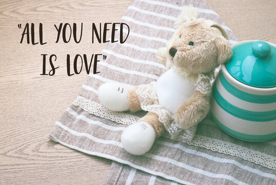 Love quote with bear and green jar picture, "All you need is love"