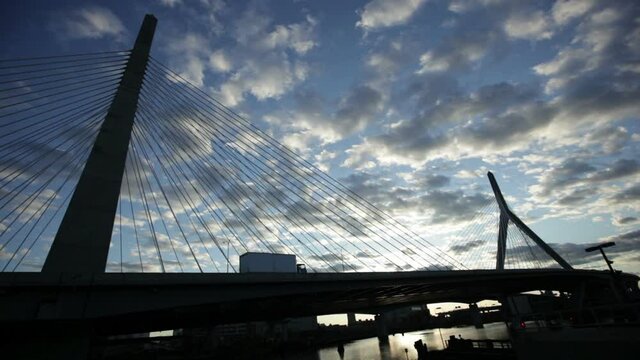 sunset clouds behind Boston's Zakim Bunker Hill Memorial Bridge