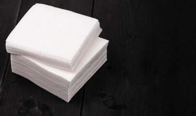 white paper napkins on wooden background Close up