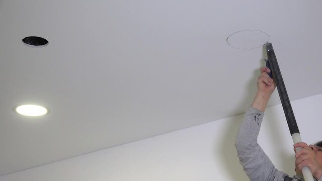 Preparation works for led light panel installation in ceiling