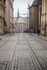 Tramway running down the centre of a street in Krakow, Poland