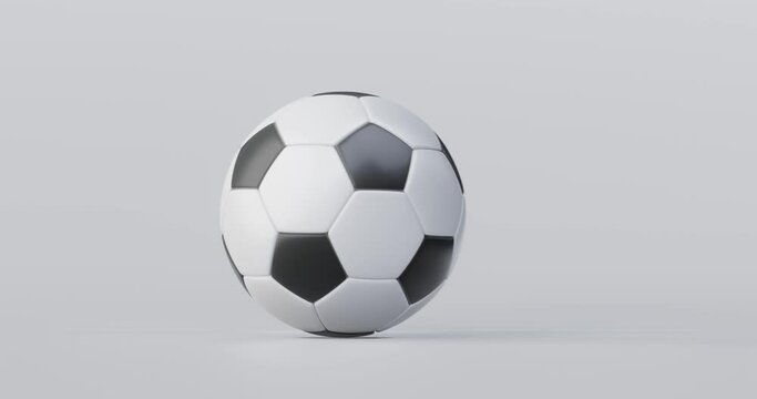 Soccer ball or football and sport equipment on white background with classic competition. 3D rendering.