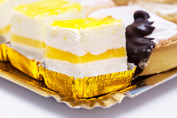 tray of cakes of various flavors