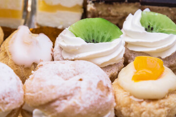 tray of cakes of various flavors