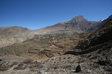 View of the Jhong Khola Valley, Dajong Paldip in the background, 5,413 meters high mountain. Around Annapurna Trek. Nepal. Asia.
