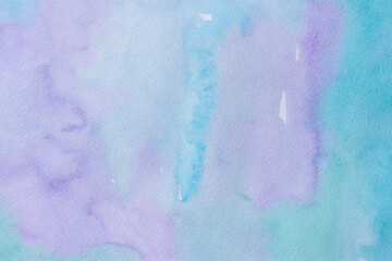Watercolor turquoise purple background. Abstract gentle background of sky or water. Colorful paper texture for modern design. Blue blurred movements, transparent light watercolor drawing.Summer banner