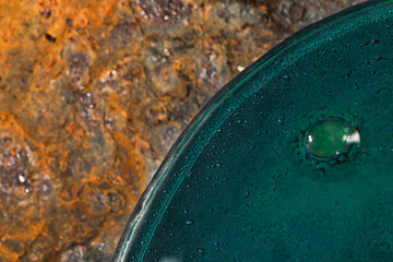 Fragment of a green and blue glass plate.