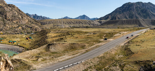 Russia, Aliai, panorama of the autumn landscape. Road, mountains and hills