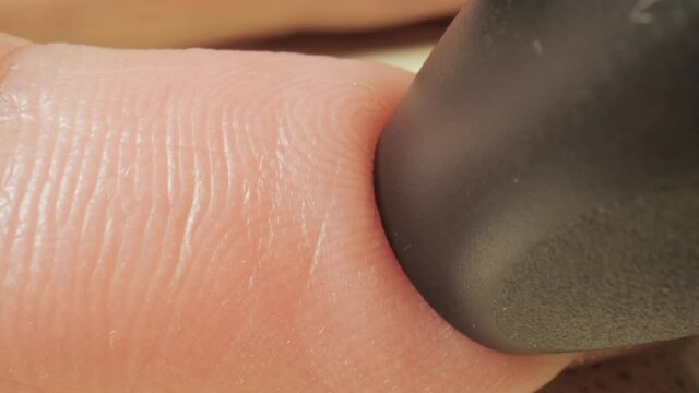 Diabetic patient checks and measures blood glucose level using glucose meter. Test blood sugar level. Treatment and control diabetes. Healthcare and diabetic. Macro shot