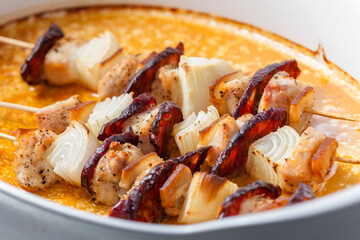 skewers with meat, bacon and onion