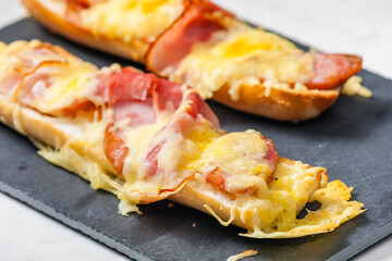 baguette baked with ham and cheese