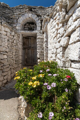 Fototapeta na wymiar Trulli houses in Alberobello, UNESCO site, Apulia region, Italy