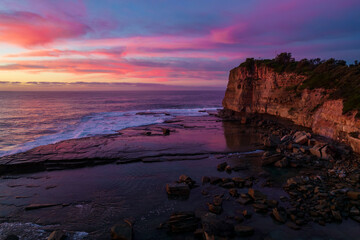 Aerial Sunrise Seascape at Rocky Inlet with colourful high cloud