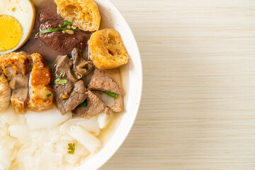 paste of rice flour or boiled Chinese pasta square in clear soup