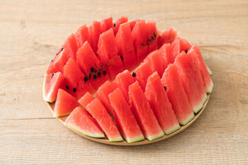 fresh watermelon sliced on plate