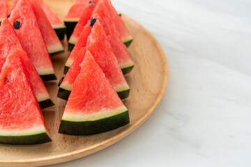 fresh watermelon sliced on plate