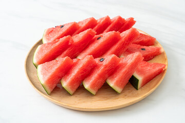 fresh watermelon sliced on plate