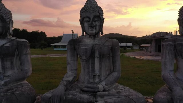 Aerial view image of Many Statue buddha image at sunset in southern of Thailand
