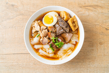 paste of rice flour or boiled Chinese pasta square in clear soup