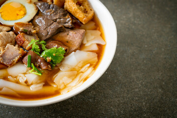 paste of rice flour or boiled Chinese pasta square in clear soup