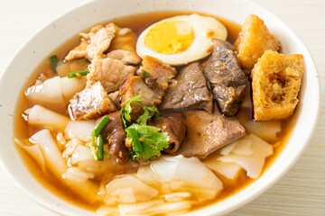 paste of rice flour or boiled Chinese pasta square in clear soup