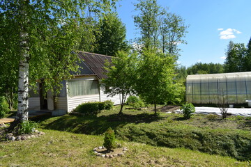 Fototapeta na wymiar plot of a country house, spring