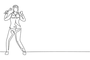 Fototapeta na wymiar Single one line drawing female mechanic stands up with celebrate gesture and holding wrench to perform maintenance vehicle engine. Success job. Continuous line draw design graphic vector illustration