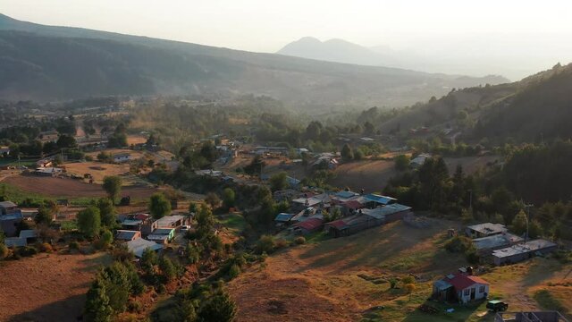 Drone Aerial Footage of mountains of El Rosario, Michoacan, Mexico during sunrise