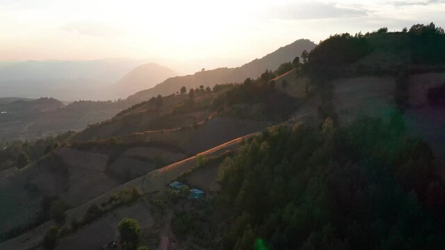Drone Aerial Footage of mountains of El Rosario, Michoacan, Mexico. Sunrise