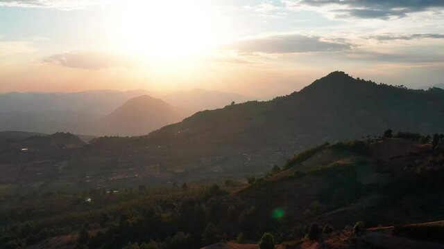 Drone Aerial Footage of sunrise over mountains of El Rosario, Michoacan, Mexico