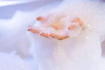 Hands woman she was bathing in a a bathtub with happiness