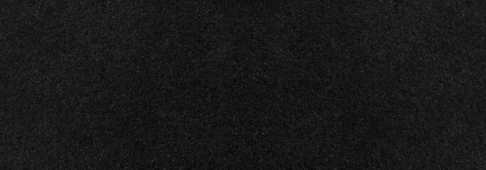 Panorama of Black polished sandstone wall texture and seamless background